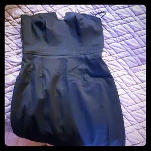 Black cotton blend strapless dress.